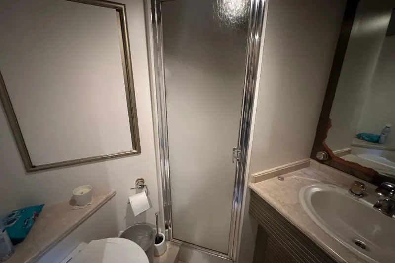 Slide: The Image of Interior hallway of 1997 Tarrab 77 Motor Yacht with mirrored walls and ambient lighting. - 47