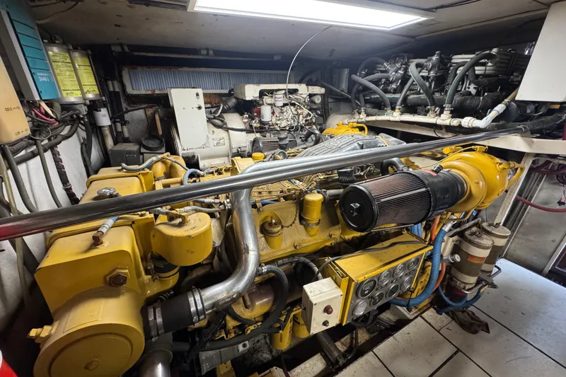 Slide: The Image of Engine room of a 1997 Tarrab 77 Motor Yacht with visible machinery and components. - 67