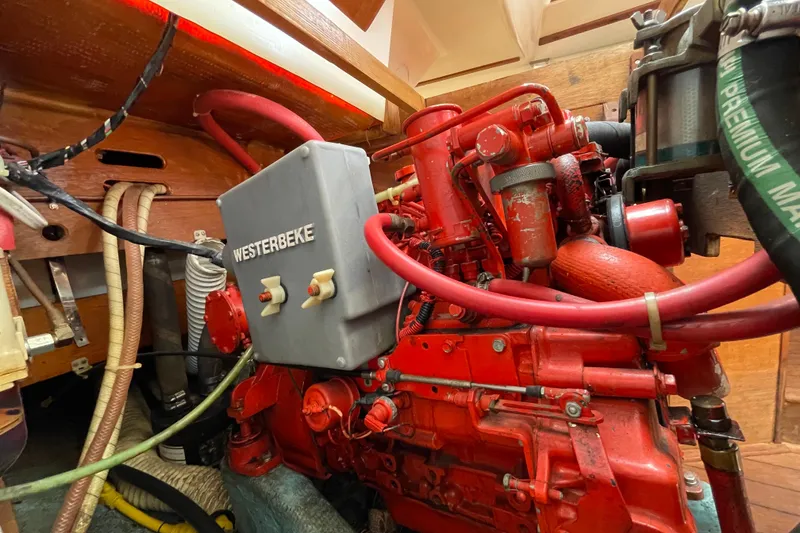 Slide: The Image of Engine compartment of a 1982 Sabre 34 sailboat with a Westerbeke engine. - 33