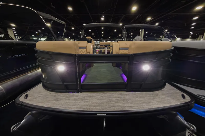 Slide: The Image of 2026 Godfrey Monaco 235 SFL pontoon boat with elegant seating and ambient lighting. - 1