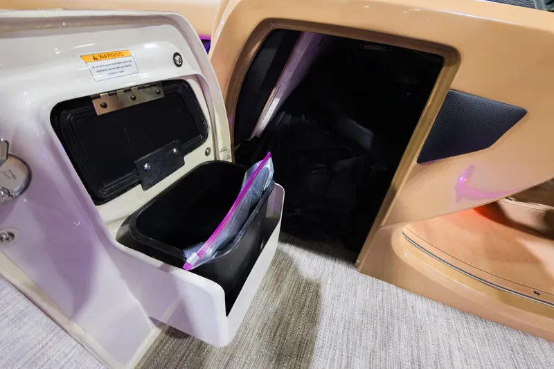 Slide: The Image of Storage compartment in 2026 Godfrey Monaco 235 Single Flip Lounge boat interior. - 12