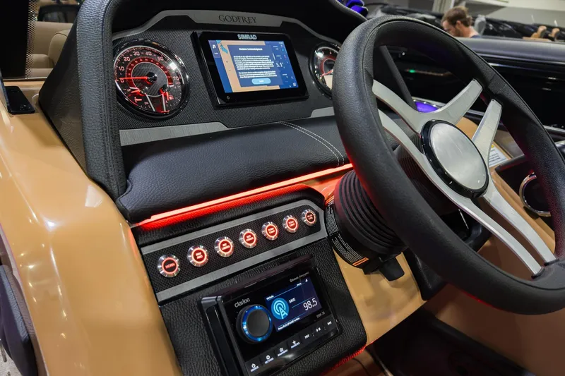 Slide: The Image of Steering console of 2026 Godfrey Monaco 235 SFL with modern controls and display. - 15