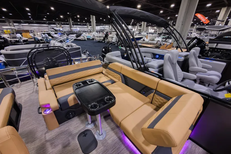 Slide: The Image of Luxurious 2026 Godfrey Monaco 235 SFL pontoon boat with elegant seating and modern amenities. - 18