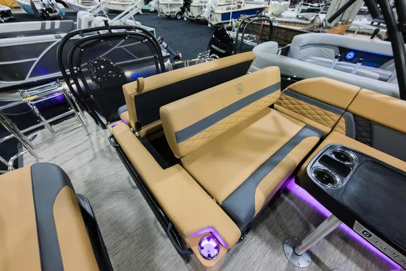 Slide: The Image of Luxurious seating on 2026 Godfrey Monaco 235 Single Flip Lounge boat with cup holders and ambient lighting. - 28