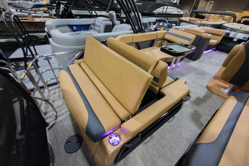 Slide: The Image of 2026 Godfrey Monaco 235 SFL boat interior with luxurious seating and modern design. - 29
