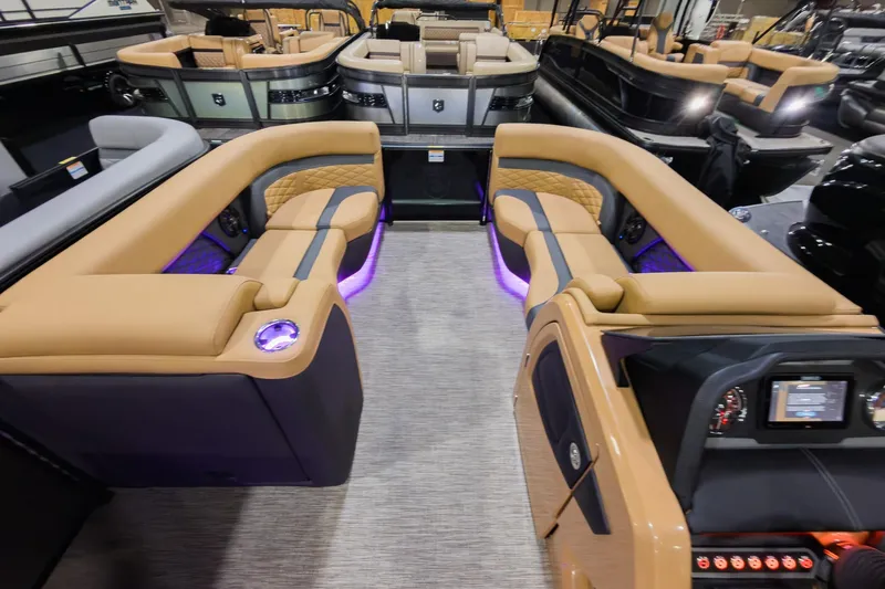 Slide: The Image of 2026 Godfrey Monaco 235 SFL pontoon boat with luxurious seating and ambient lighting. - 34