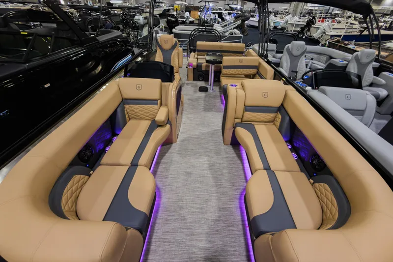 Slide: The Image of Luxurious interior of 2026 Godfrey Monaco 235 SFL pontoon boat with elegant seating and ambient lighting. - 5