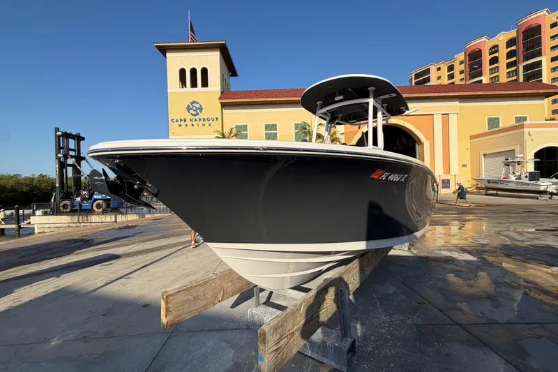 Slide: The Image of 2023 Sportsman Open 232 Center Console boat at Cape Harbour Marina. - 3