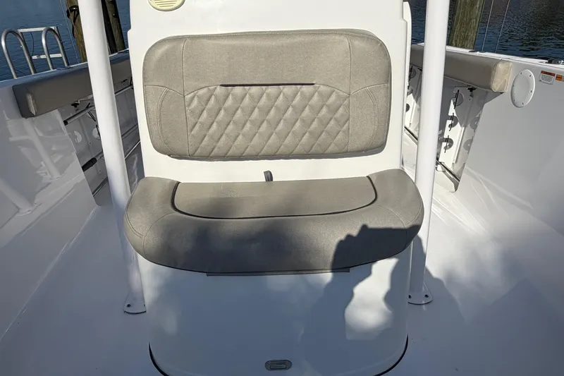 Slide: The Image of 2023 Sportsman Open 232 Center Console boat seat with cushioned backrest and sleek design. - 35