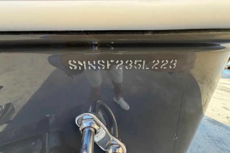 Slide: The Image of 2023 Sportsman Open 232 Center Console hull identification number close-up. - 48