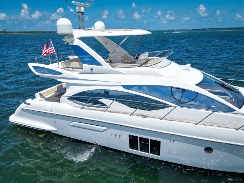 Slide: The Image of Azimut 54 Fly 2015 yacht cruising on blue ocean under clear sky. - 10