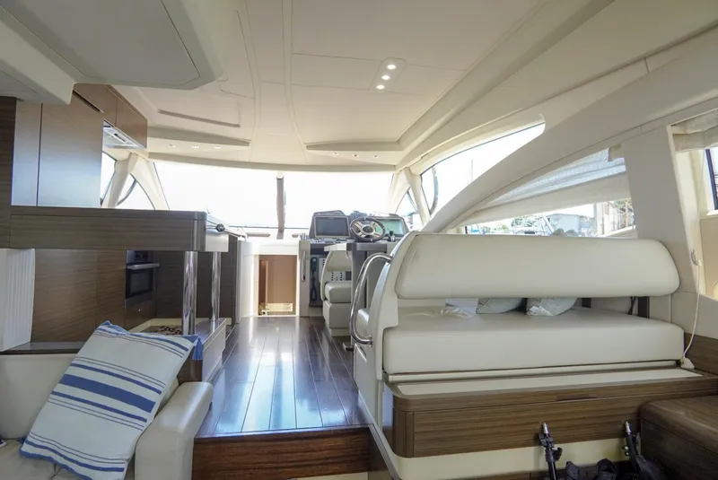 Slide: The Image of Luxurious interior of 2015 Azimut 54 Fly yacht with modern design and plush seating. - 36