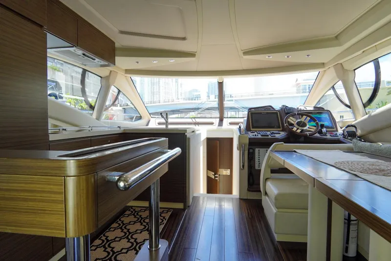 Slide: The Image of Luxurious interior of 2015 Azimut 54 Fly yacht with modern helm and elegant wood finishes. - 42