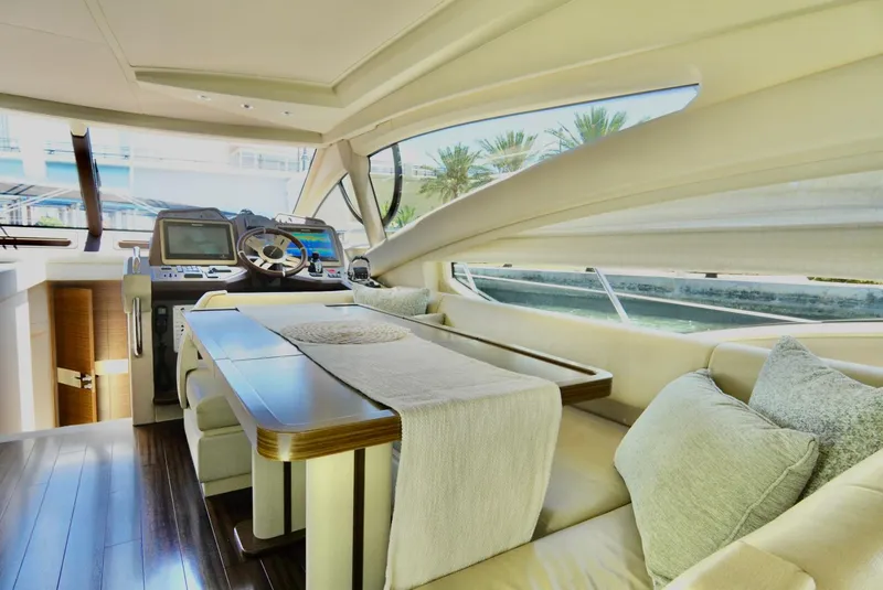 Slide: The Image of Luxurious interior of 2015 Azimut 54 Fly yacht with elegant seating and navigation area. - 44