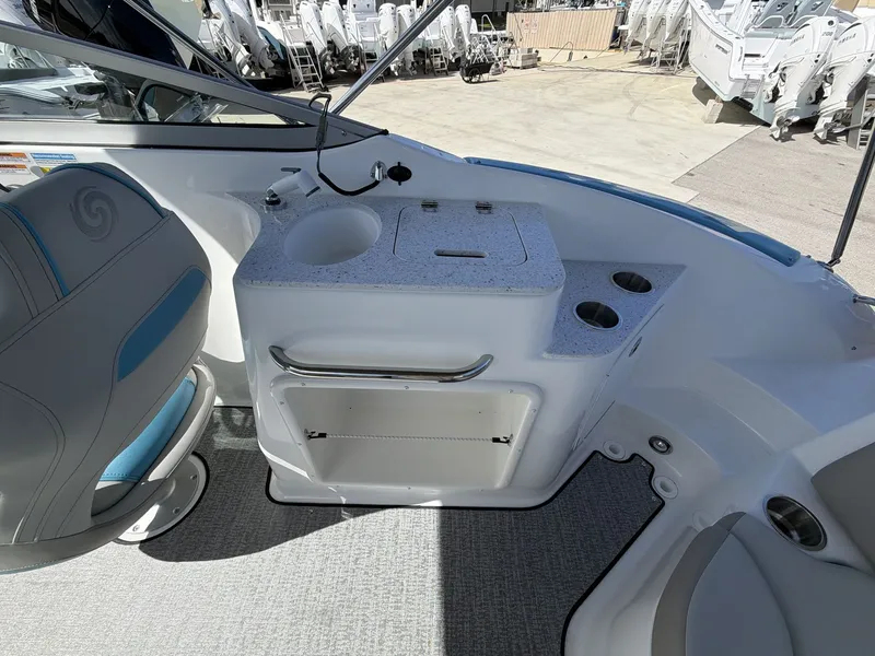 Slide: The Image of Interior of 2026 Hurricane 2400 SD with seating and sink. - 14