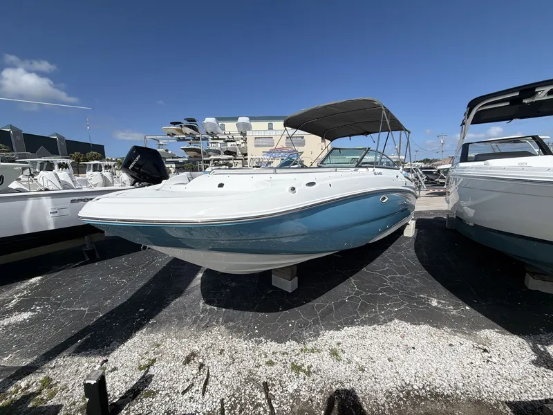 Slide: The Image of 2026 Hurricane 2400 SD boat on a parking lot. - 3