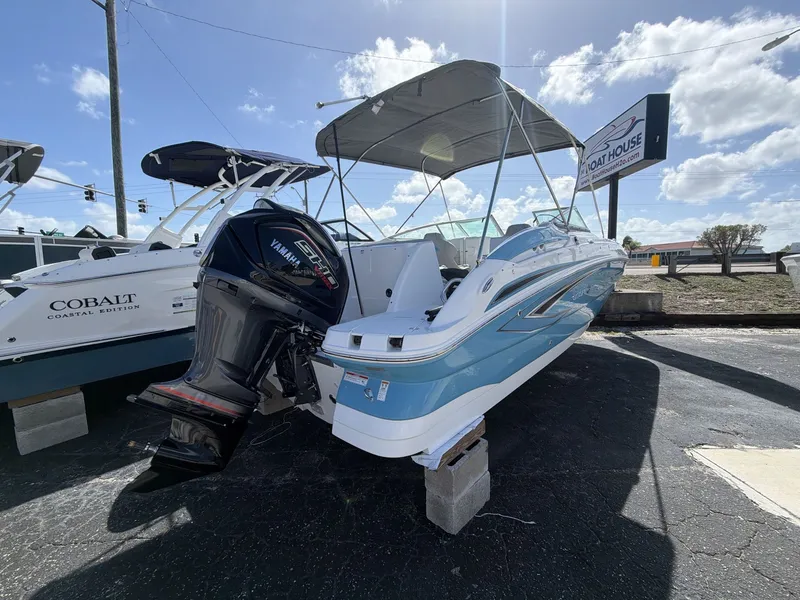 Slide: The Image of 2026 Hurricane 2400 SD boat with Yamaha outboard motor. - 7