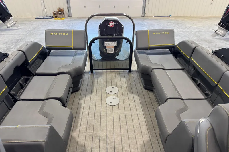 Slide: The Image of Interior view of 2025 Manitou 24 Explore pontoon boat with spacious seating. - 10
