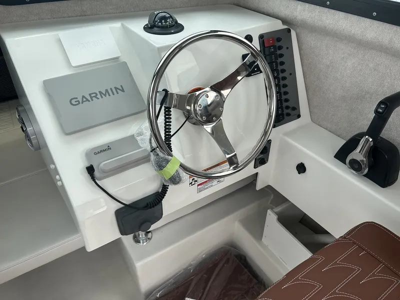 Slide: The Image of Parker 217 Explorer helm with Garmin navigation system. - 6