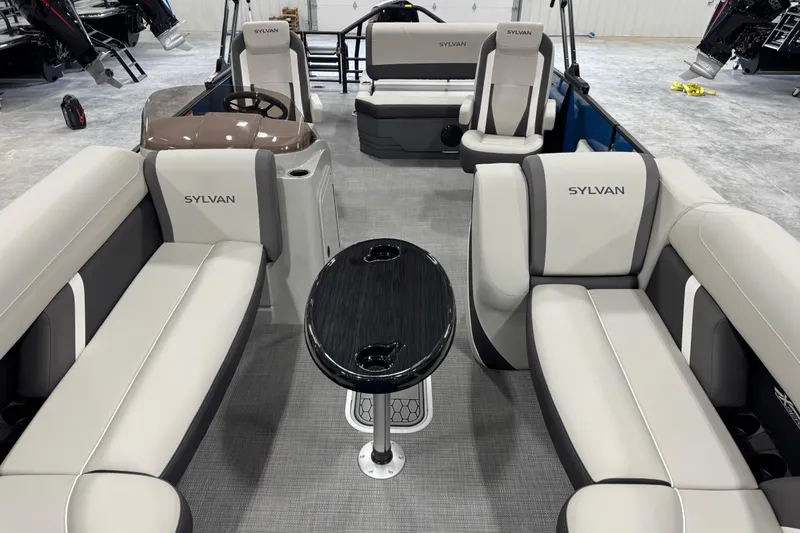 Slide: The Image of 2026 Sylvan Mirage X X5 pontoon boat interior with luxurious seating and sleek design. - 8