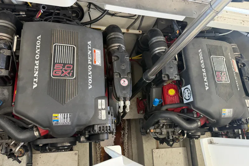 Slide: The Image of Twin Volvo Penta 5.0 GXI engines in a 2005 Cobalt 282 boat. - 19