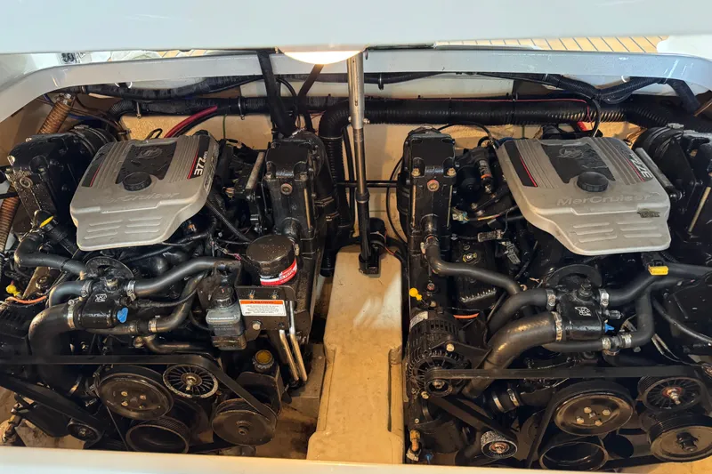 Slide: The Image of Twin MerCruiser engines in a 2009 Formula 310 Bowrider boat engine compartment. - 15