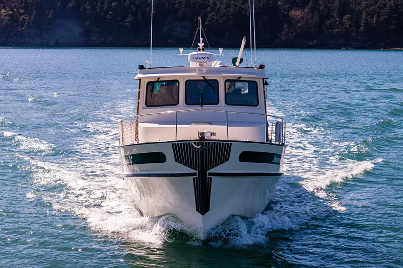 Slide: The Image of Nordic Tug 42 (1997) cruising on a sunny day in open waters. - 39
