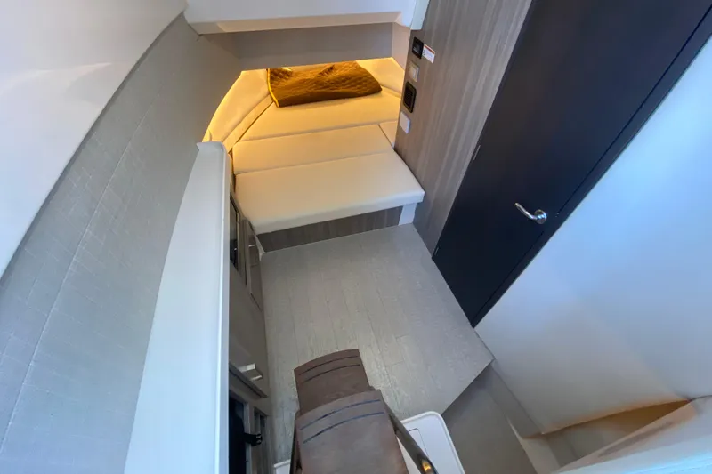 Slide: The Image of 2021 Regal 38 SAV interior cabin with modern design and ambient lighting. - 21
