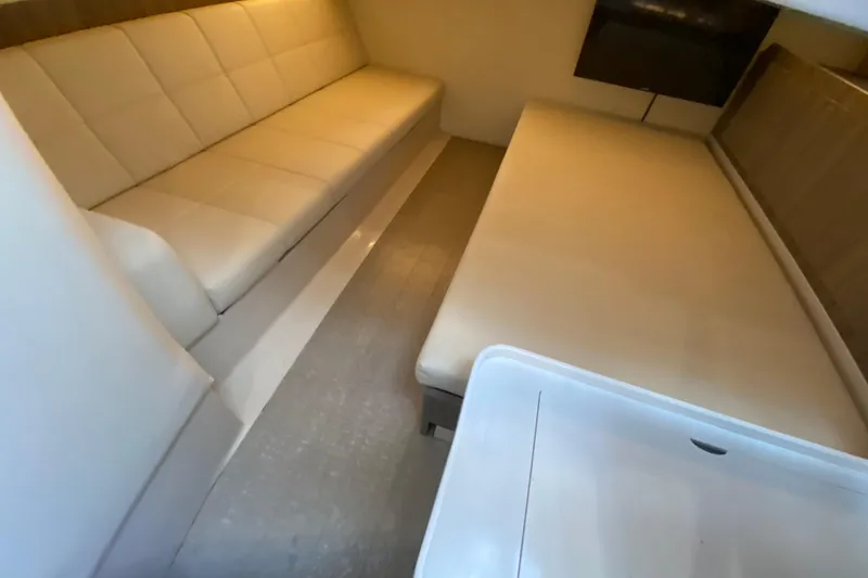 Slide: The Image of Interior of 2021 Regal 38 SAV boat with beige seating and modern design. - 23