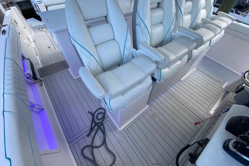 Slide: The Image of Luxurious seating on 2021 Regal 38 SAV boat with modern interior design. - 27