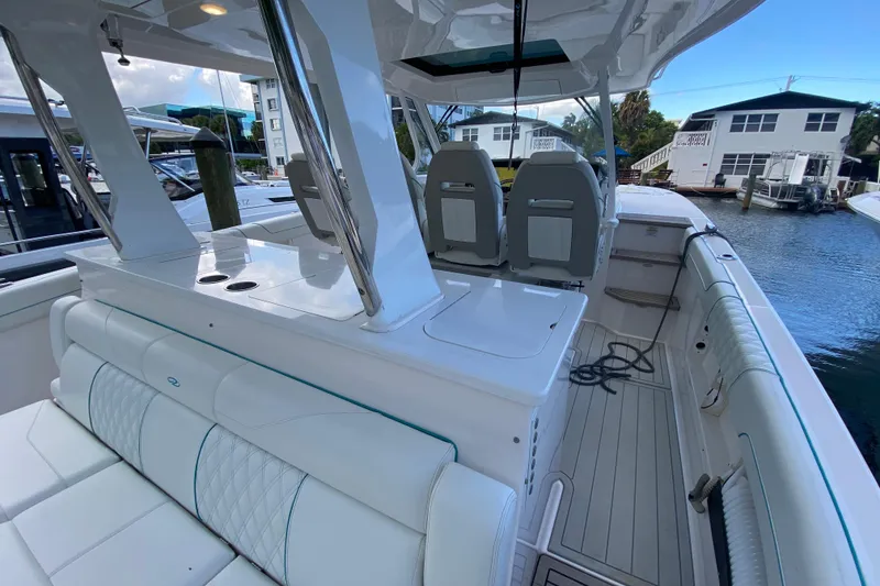 Slide: The Image of 2021 Regal 38 SAV boat interior with luxurious seating and modern design. - 33