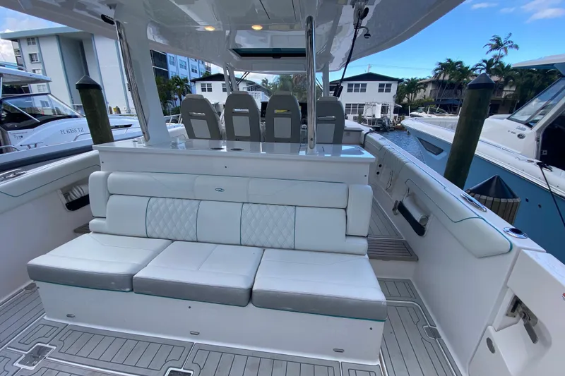 Slide: The Image of 2021 Regal 38 SAV boat interior with white seating and modern design. - 35