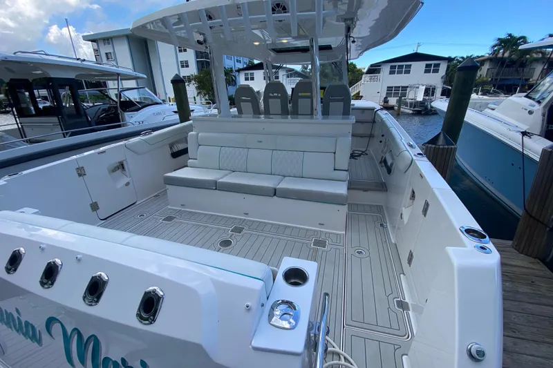 Slide: The Image of 2021 Regal 38 SAV boat interior with spacious seating and modern design. - 38