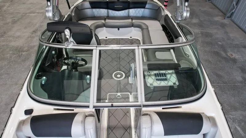 Slide: The Image of Interior view of a 2013 MasterCraft X-35 boat with gray seating. - 10
