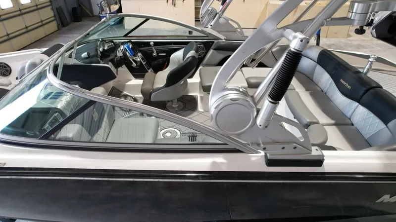 Slide: The Image of Interior of a 2013 MasterCraft X-35 boat with modern seating. - 14