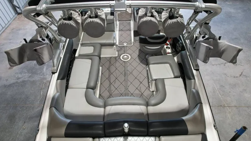 Slide: The Image of Interior of a 2013 MasterCraft X-35 boat with gray upholstery. - 18