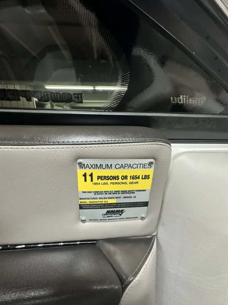 Slide: The Image of Malibu Wakesetter VLX 21 boat capacity: 11 persons or 1654 lbs. - 11