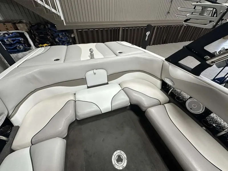 Slide: The Image of Interior of a 2005 Malibu Wakesetter VLX 21 with gray upholstery. - 14