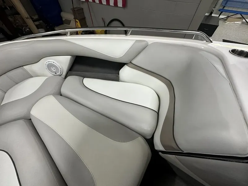 Slide: The Image of Interior of a 2005 Malibu Wakesetter VLX 21 with gray upholstery. - 5