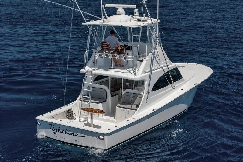 Slide: The Image of 2018 Viking 37 Billfish yacht cruising on open ocean waters. - 14