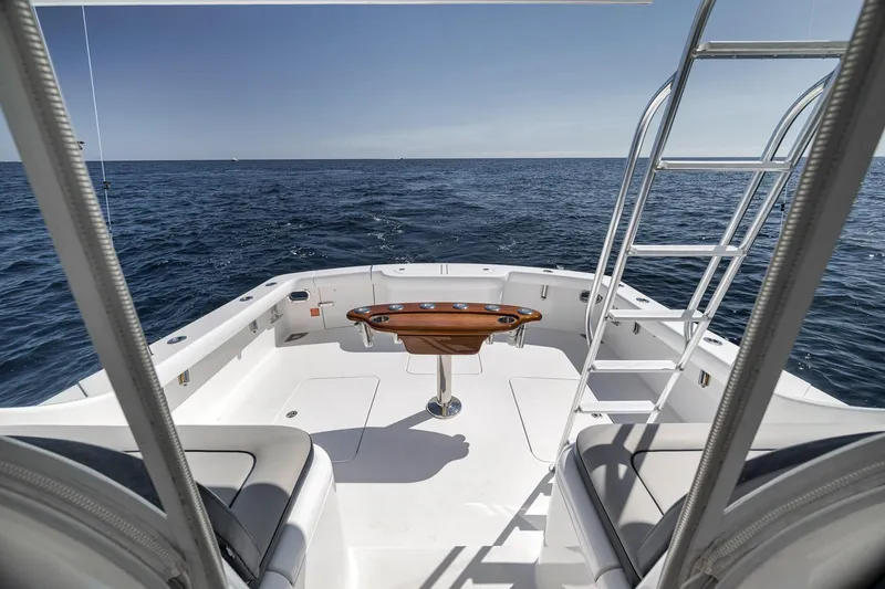 Slide: The Image of 2018 Viking 37 Billfish yacht deck with ocean view and ladder. - 16