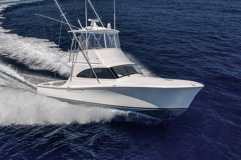 Slide: The Image of 2018 Viking 37 Billfish cruising on open water, aerial rear view. - 2