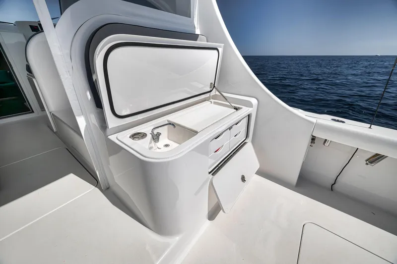 Slide: The Image of 2018 Viking 37 Billfish yacht with open storage and sink, ocean view. - 21