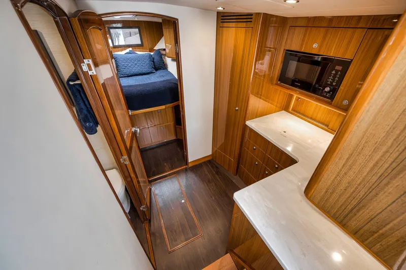 Slide: The Image of Luxurious interior of 2018 Viking 37 Billfish yacht with wood finishes and modern amenities. - 23