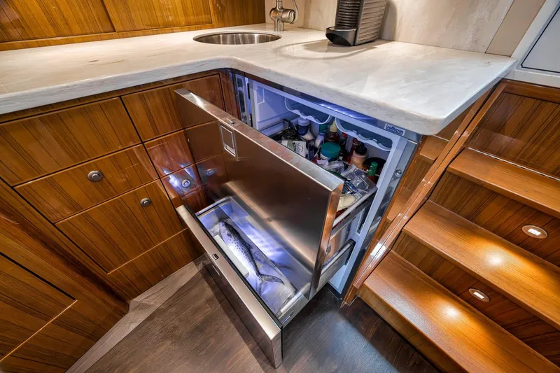 Slide: The Image of Luxurious 2018 Viking 37 Billfish yacht kitchen with open refrigerator drawer. - 27