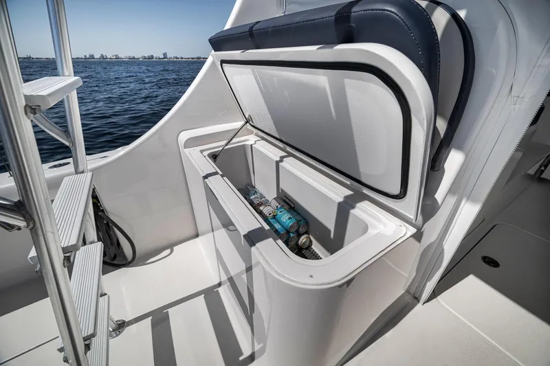 Slide: The Image of Open storage compartment on 2018 Viking 37 Billfish boat with beverages inside. - 29