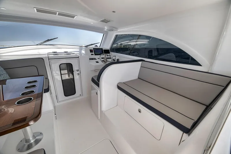 Slide: The Image of Interior of 2018 Viking 37 Billfish yacht with seating and helm station. - 32