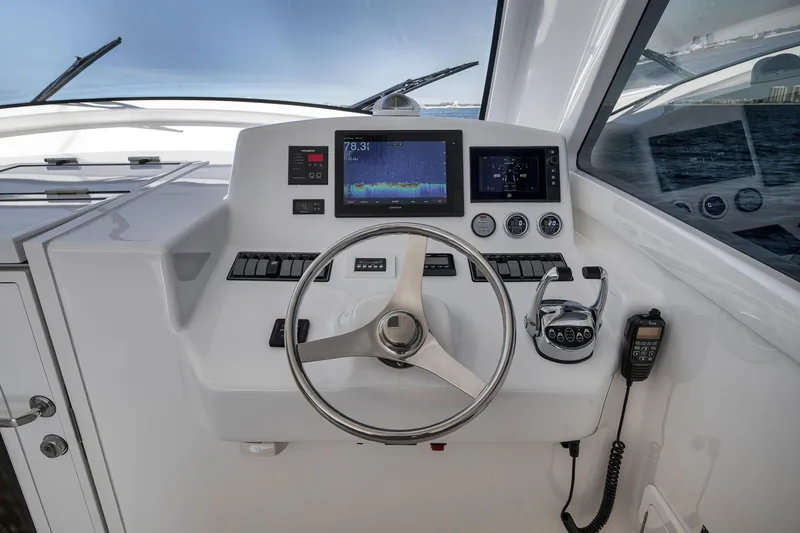Slide: The Image of Helm of 2018 Viking 37 Billfish with modern navigation and control systems. - 35