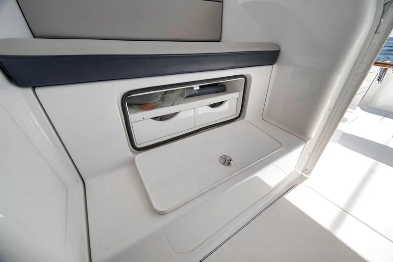 Slide: The Image of Storage compartment on a 2018 Viking 37 Billfish boat interior. - 38