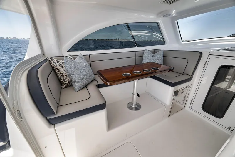 Slide: The Image of Luxurious interior of 2018 Viking 37 Billfish yacht with elegant seating and wooden table. - 39